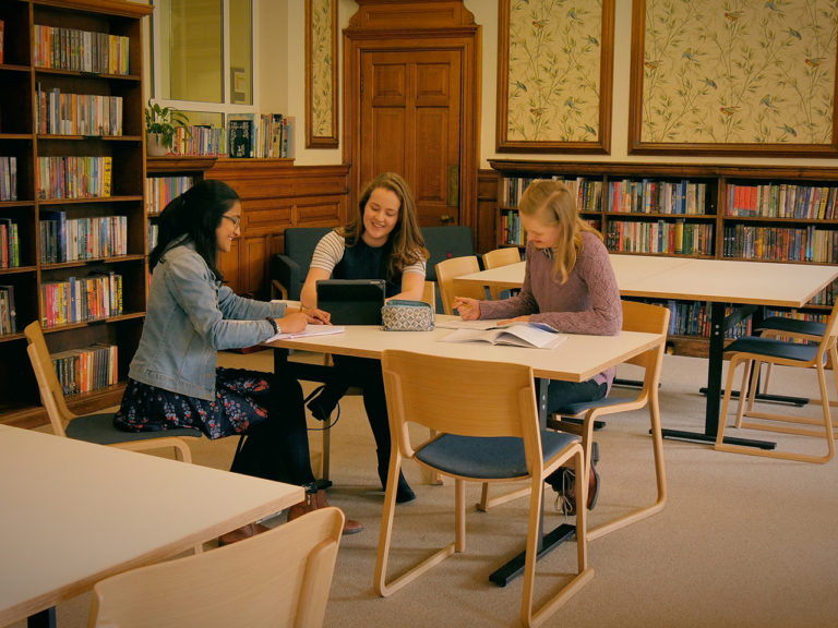 Bespoke furniture within listed school building library design